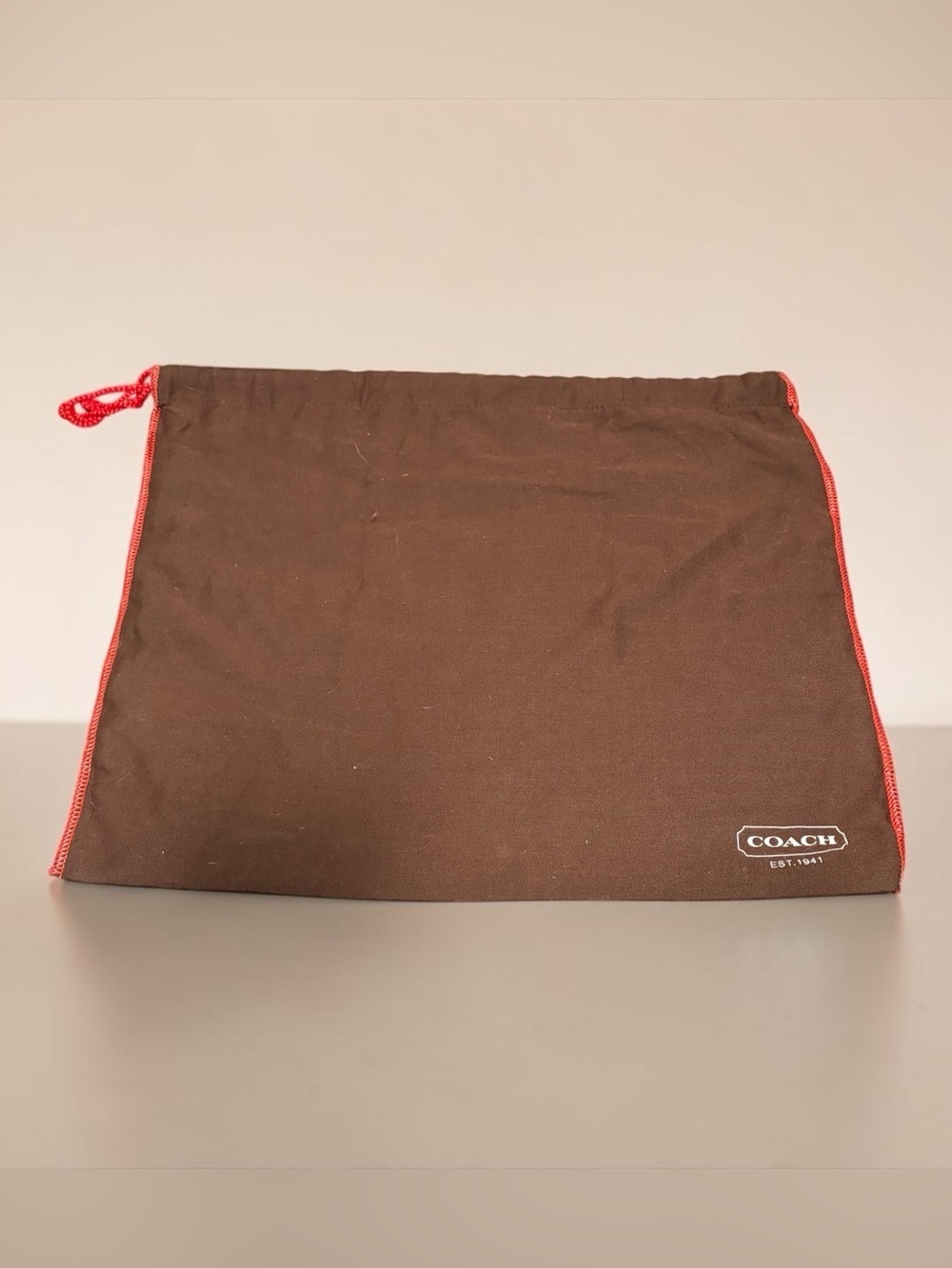 COACH Brown Dust Bag with Red Drawstring Trim